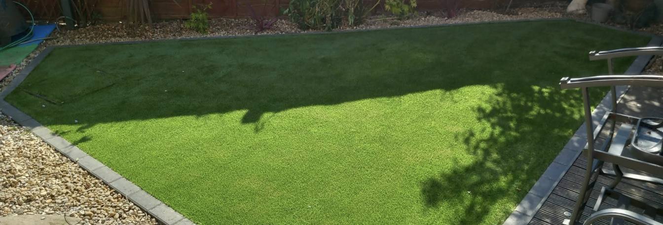Patchy worn out turf to all year green after