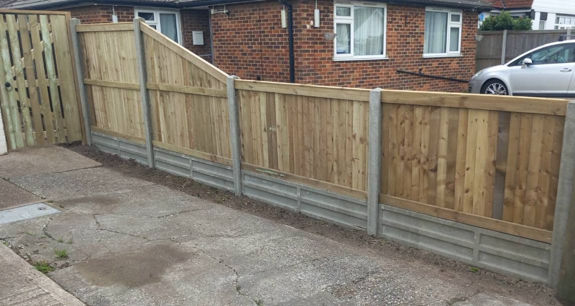 New closeboard fencing along a driveway boundary, Kent