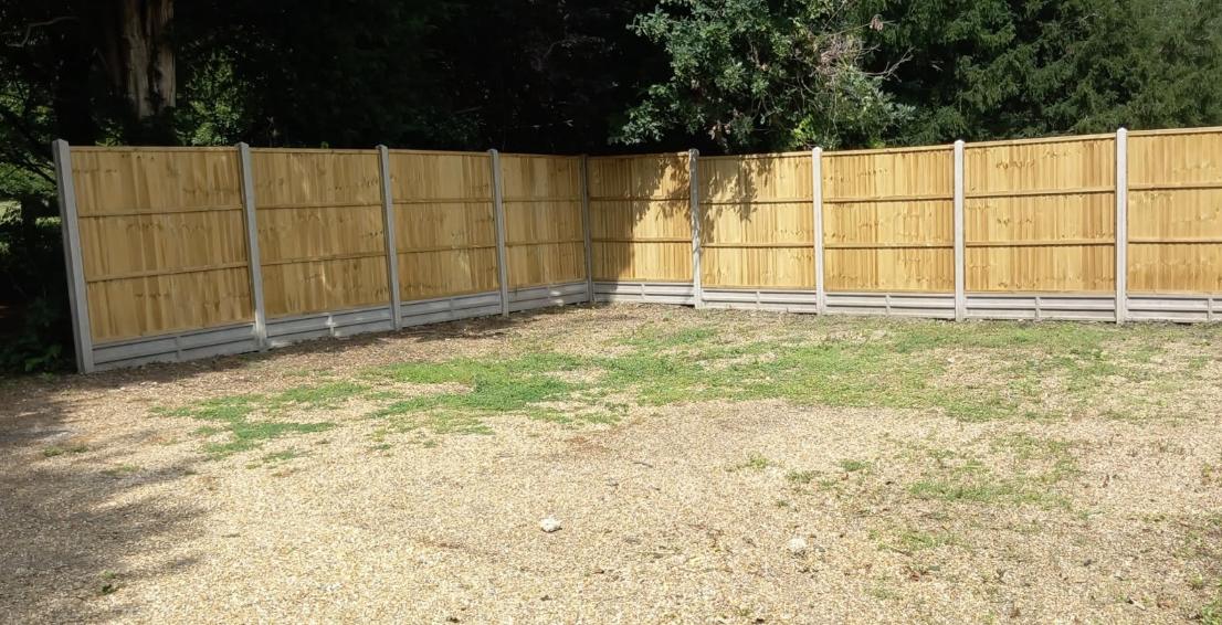 New closeboard fencing on concrete posts installed by Lawn Ranger Landscapes